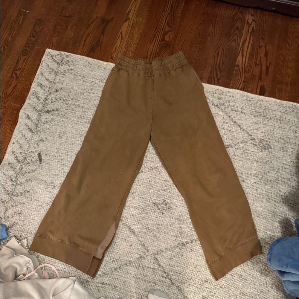 Out from under wide leg sweatpants
